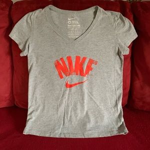 NIKE woman’s shirt size MEDIUM